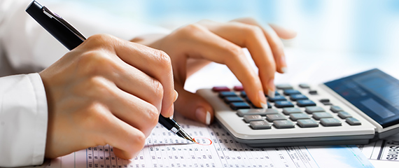 Expert doing calculations as part of accounting services